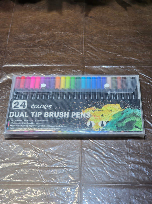 BioCode set of 24 dual tip brush pens in a transparent carry case featuring fine and brush nibs for art projects.