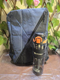 BioCode grey and black water-resistant backpack with a matching BPA-free sports water bottle with a locking lid.