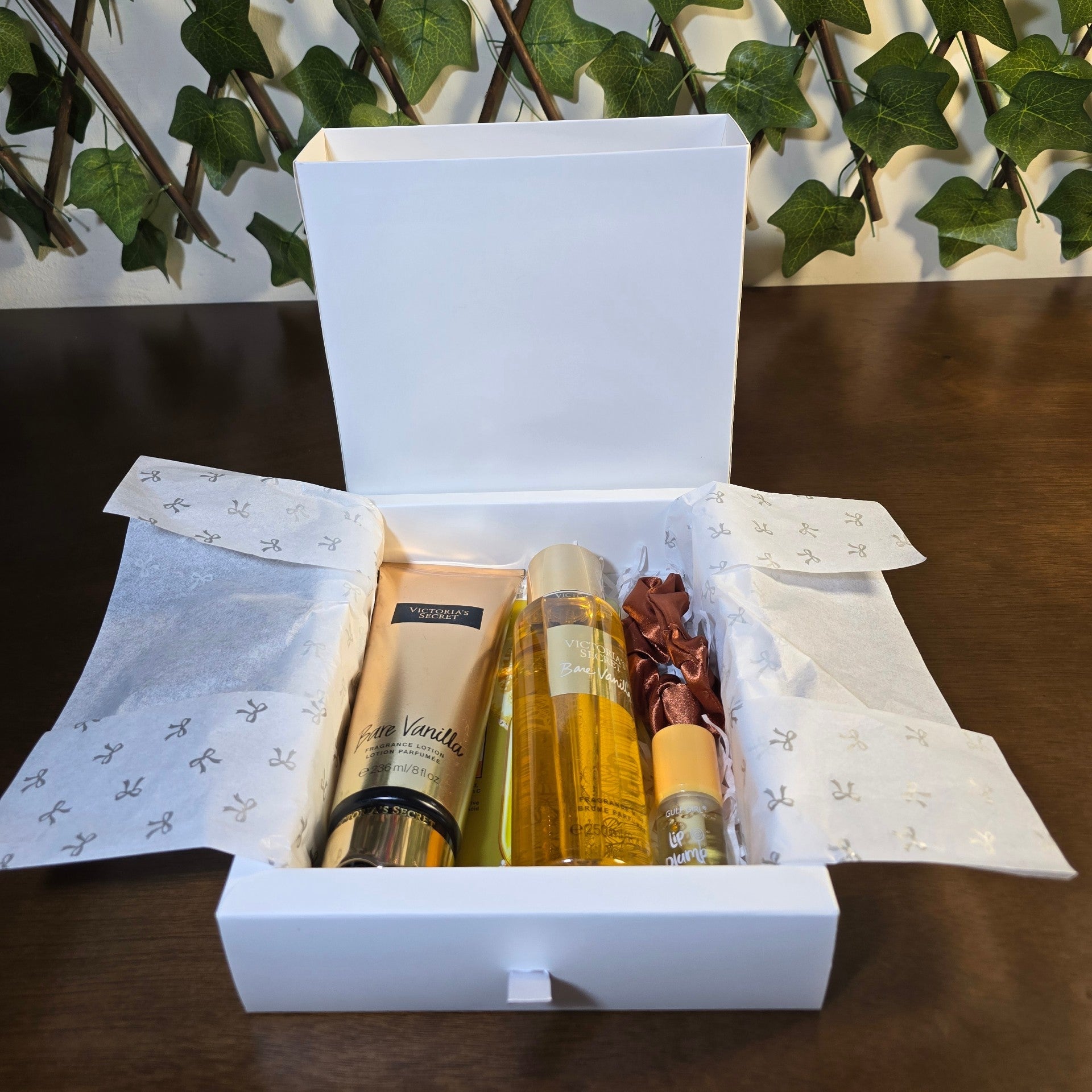BioCode Victoria's Secret Bare Vanilla gift set with fragrance lotion, mist, satin scrunchie, and lip plumper in a box