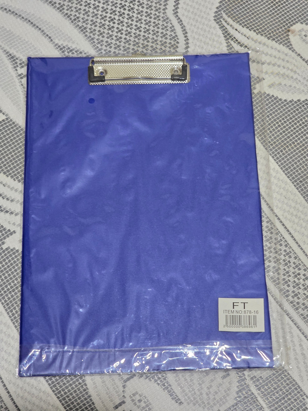 BioCode A4 blue clipboard with a sturdy metal clip and integrated side ruler, still in protective plastic packaging.