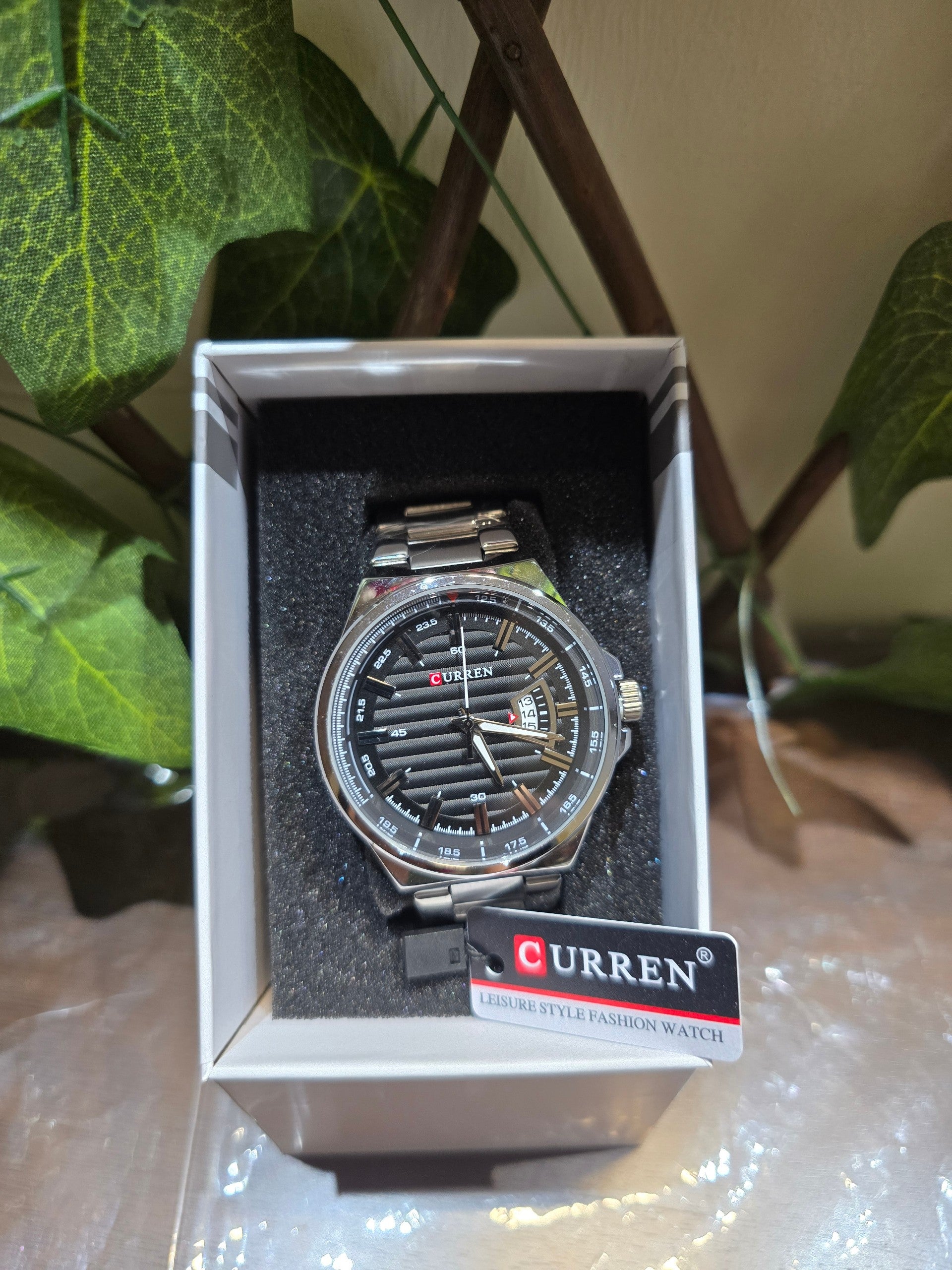 BioCode CURREN men's leisure style watch with a textured black dial and stainless steel bracelet in a gift box