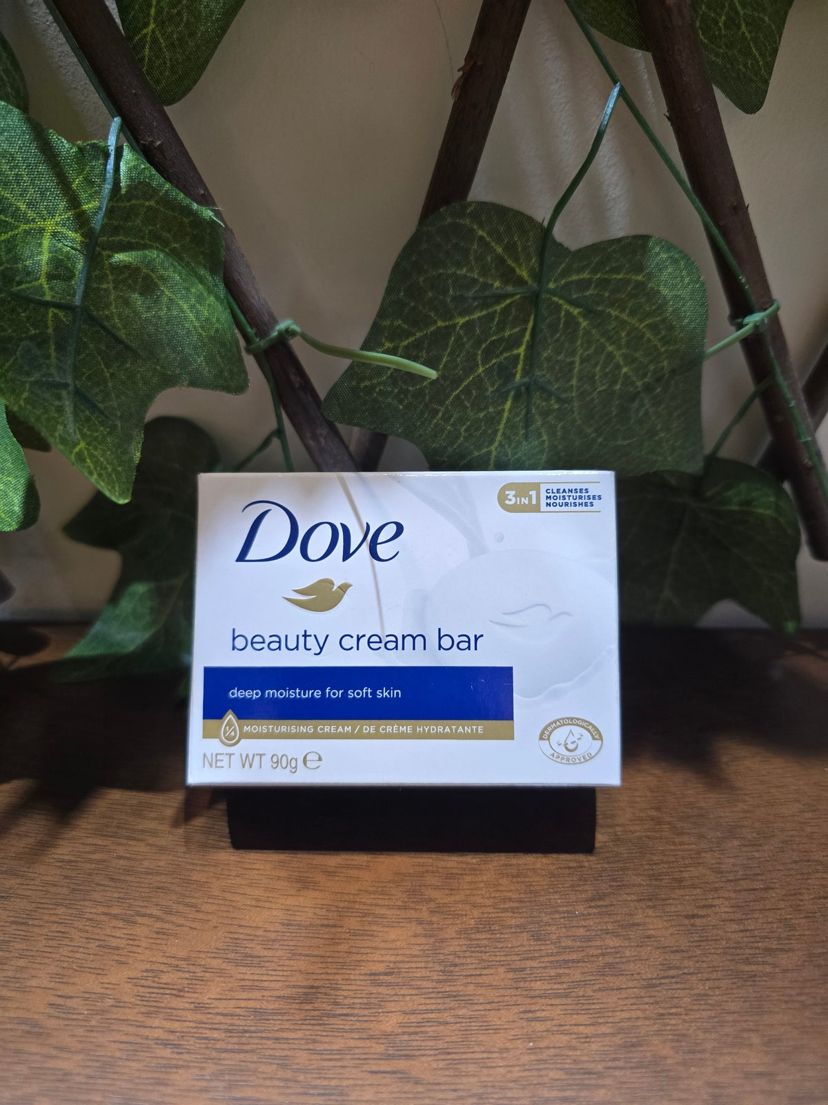 BioCode Dove beauty cream bar 90g in white packaging with blue accents, displayed against green leaves