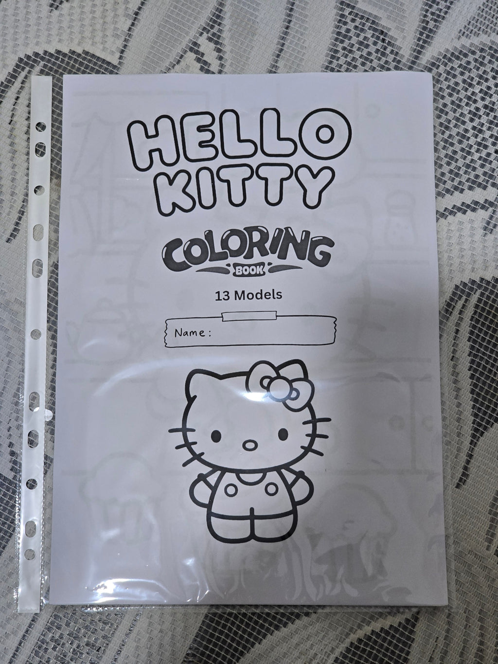 BioCode Hello Kitty colouring book with 13 unique models and a name space on the cover for children