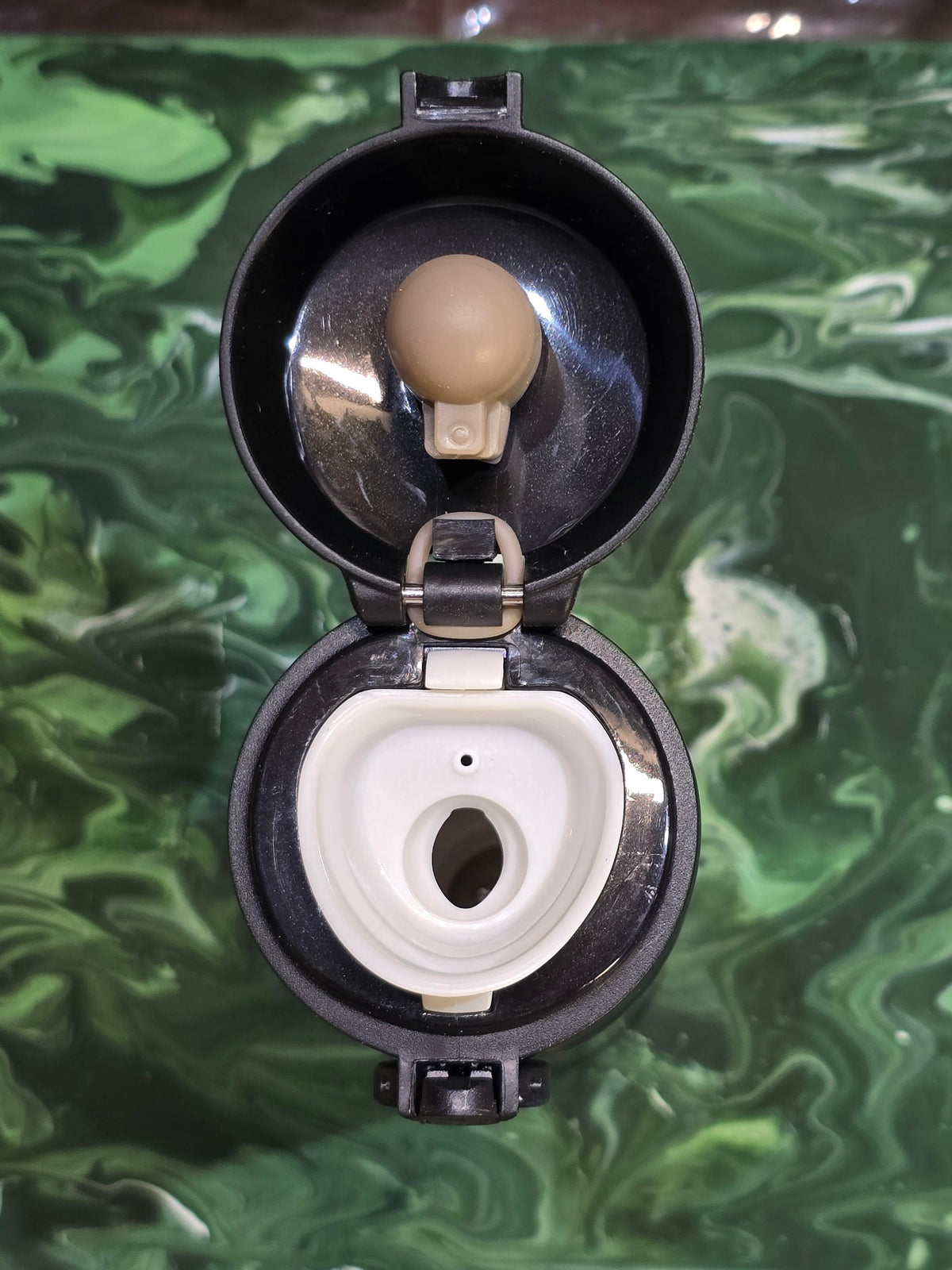 BioCode insulated stainless steel travel flask with open black leak-proof flip-top lid and white drinking spout