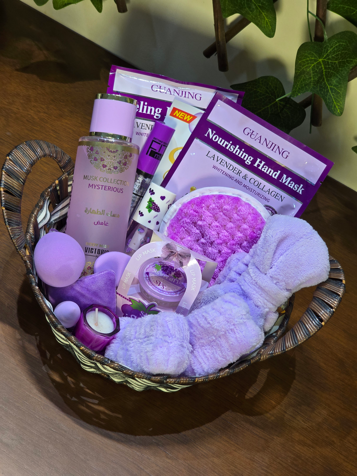 BioCode lavender-themed skincare gift basket featuring hand masks, body mist, plush headband, and scented candle.