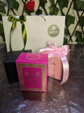 BioCode luxury gift set featuring Diamond Aqua perfume, jewellery boxes, and a gift bag with a green ribbon