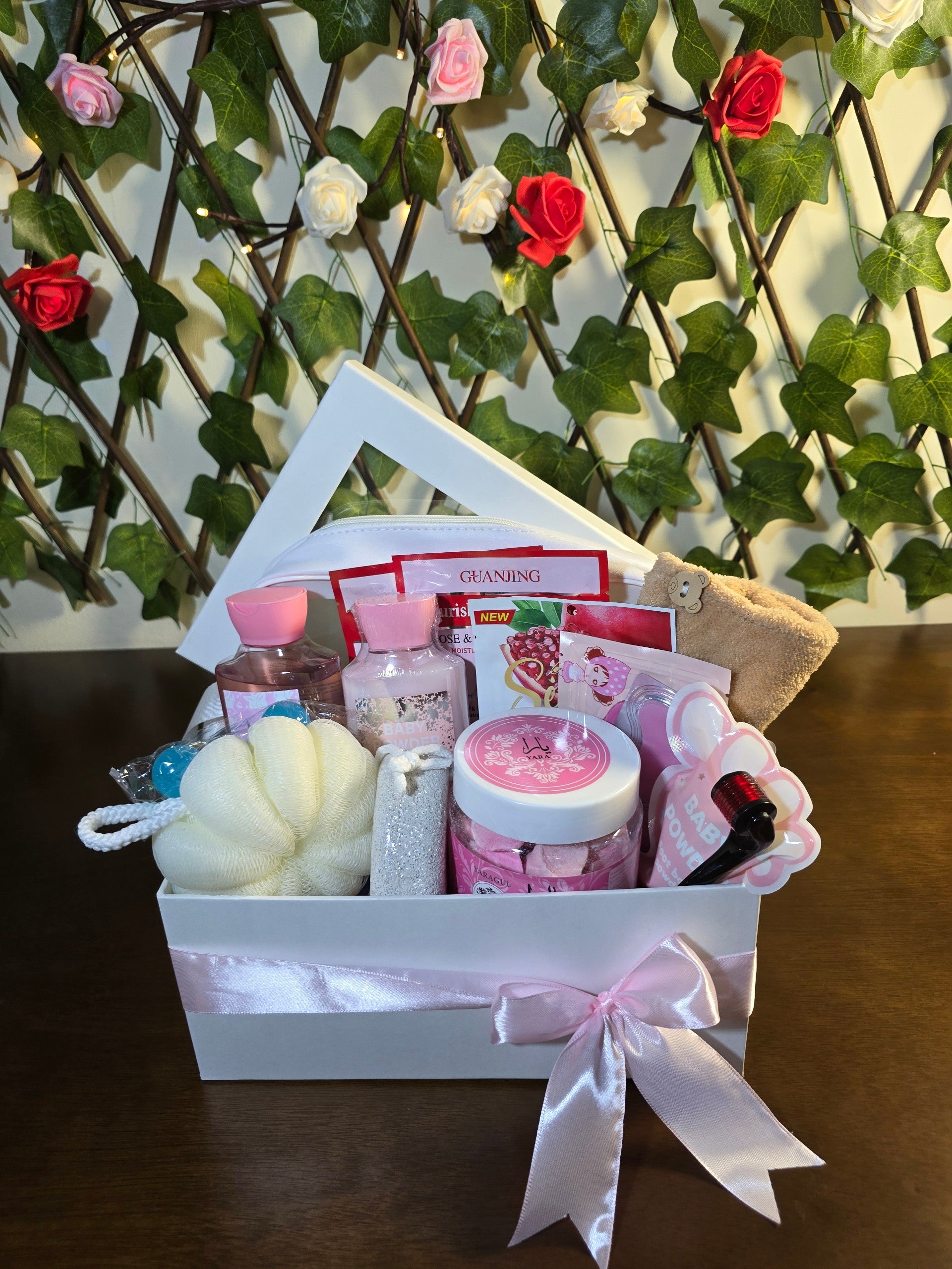 BioCode luxury pamper gift set in a white box with pink ribbon, featuring skincare, bath essentials, and accessories.