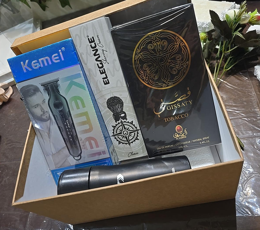 BioCode men's grooming gift set featuring a Kemei trimmer, Elegance shaving cream, No Limit spray, and Gissaty perfume.