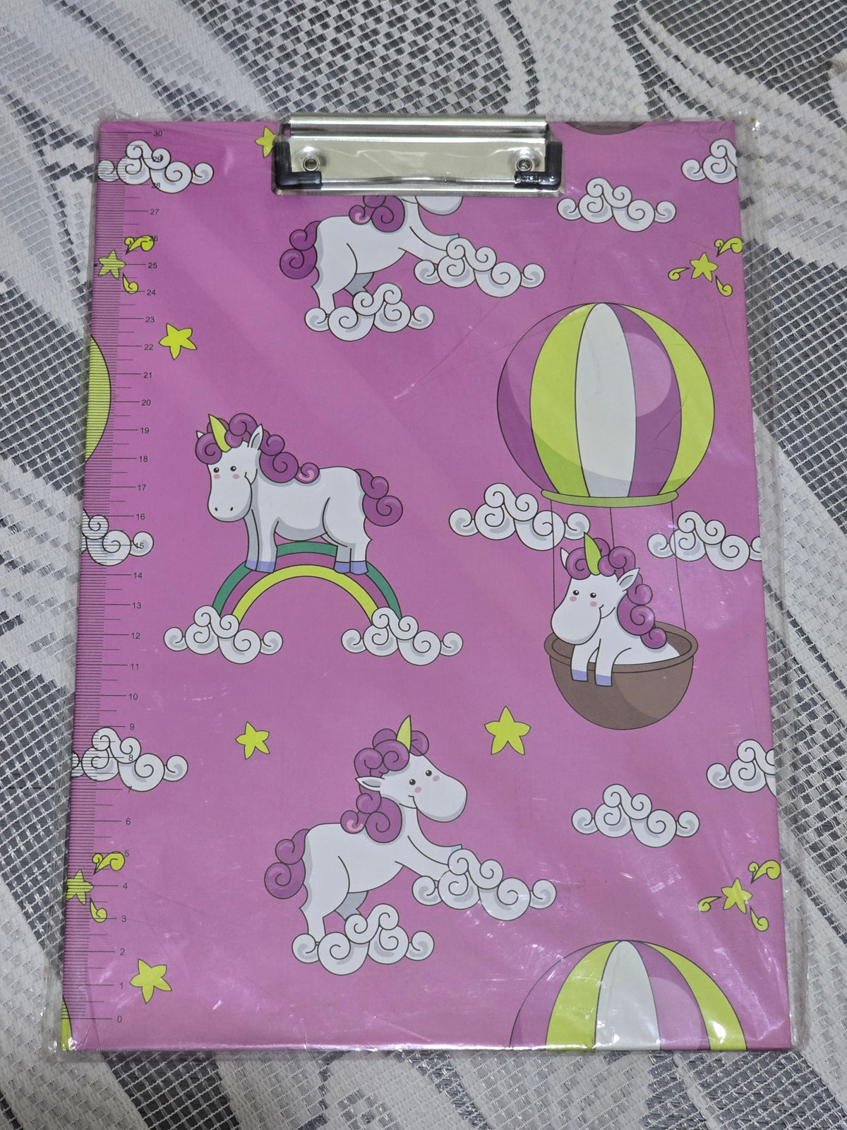 BioCode A4 clipboard in pink featuring a playful unicorn and hot air balloon pattern with an integrated side ruler.