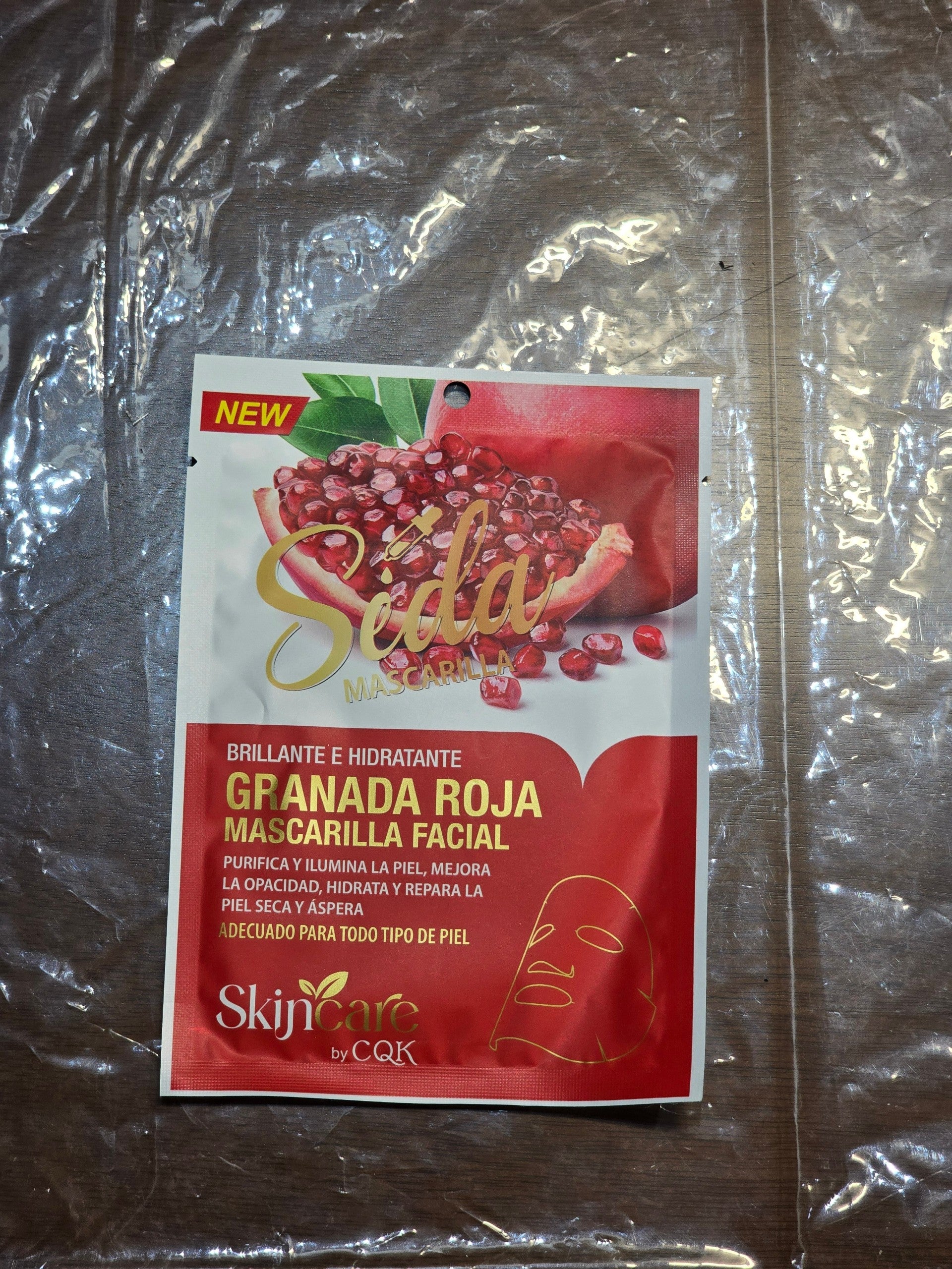 BioCode pomegranate facial sheet mask in red packaging with fruit imagery for brightening and hydrating skincare