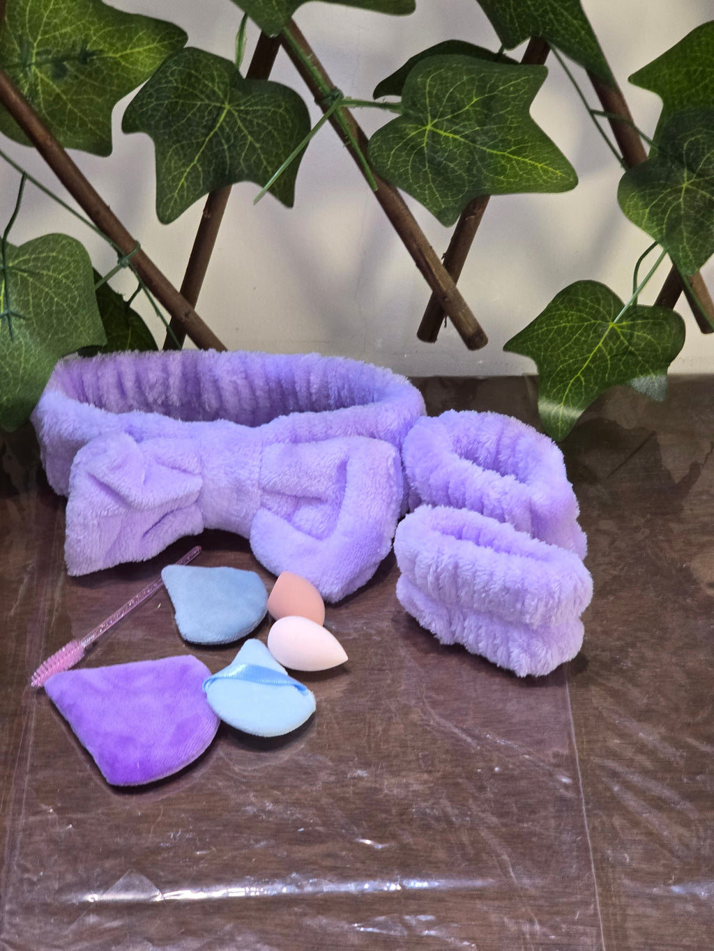 BioCode purple plush spa headband and wristband set with makeup sponges and applicator brush for skincare routines