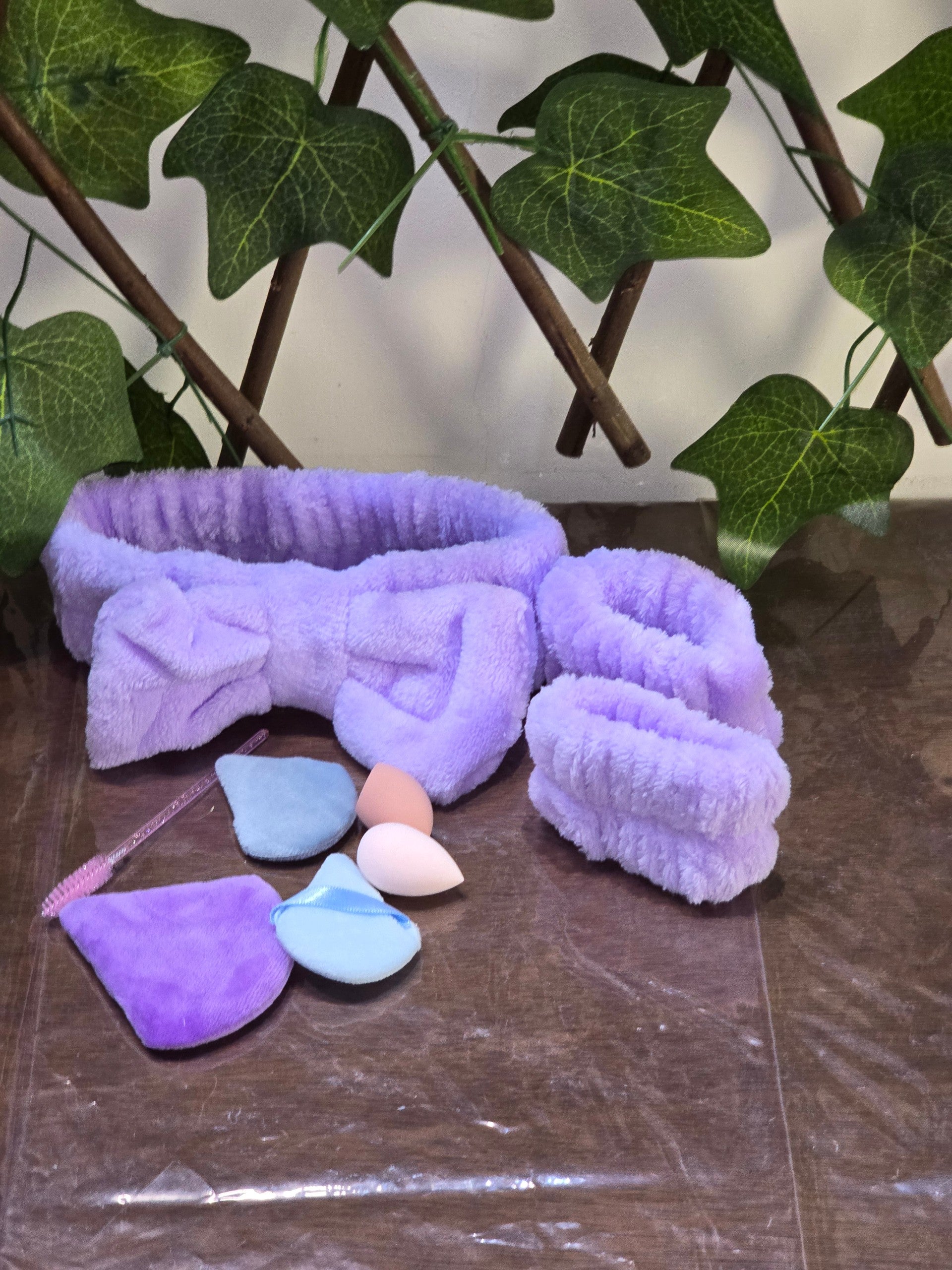 BioCode purple plush spa headband and wristband set with makeup sponges and applicator brush for skincare routines