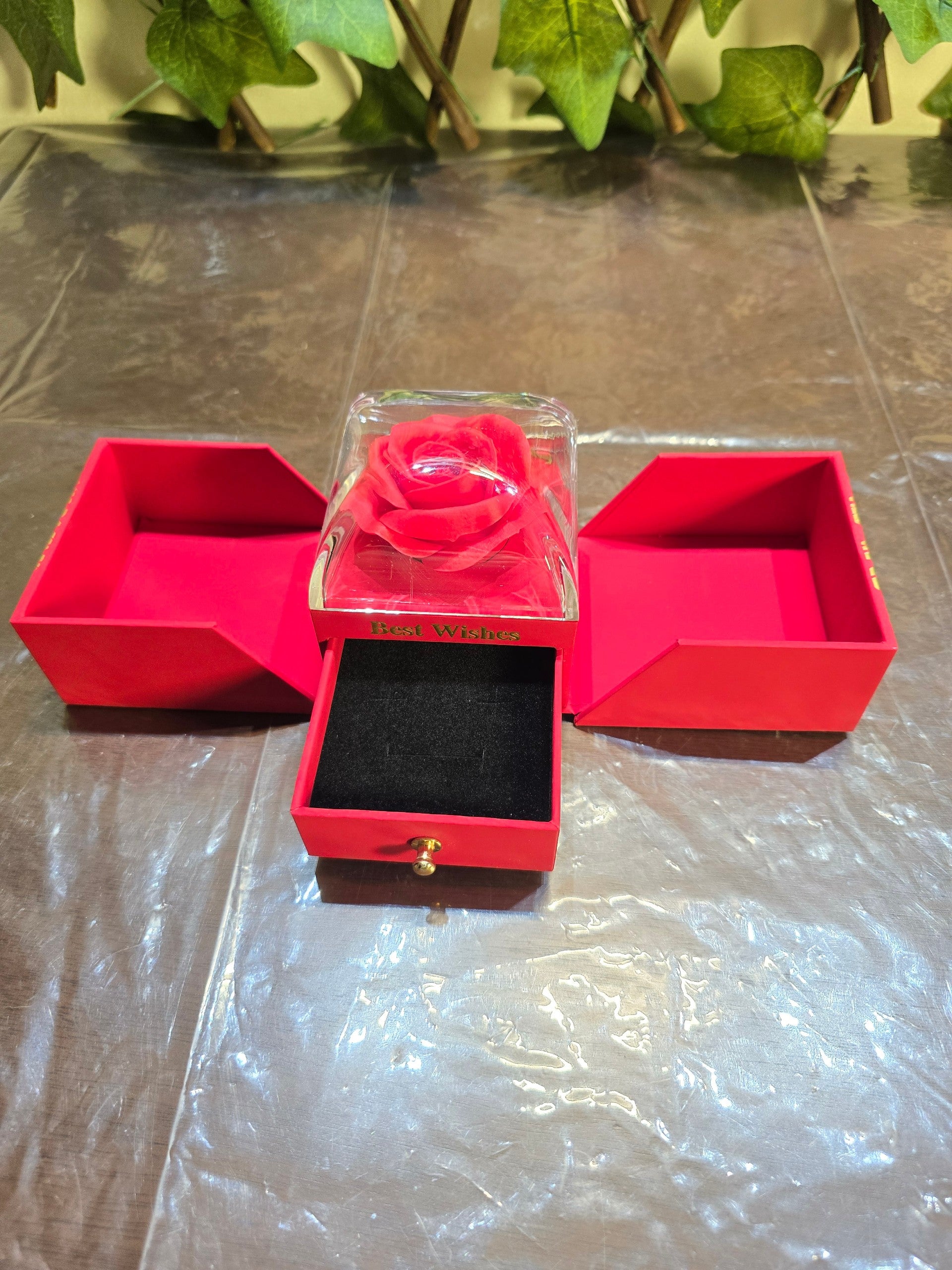 BioCode red jewellery gift box with a preserved rose in a clear display and a velvet-lined drawer for accessories.