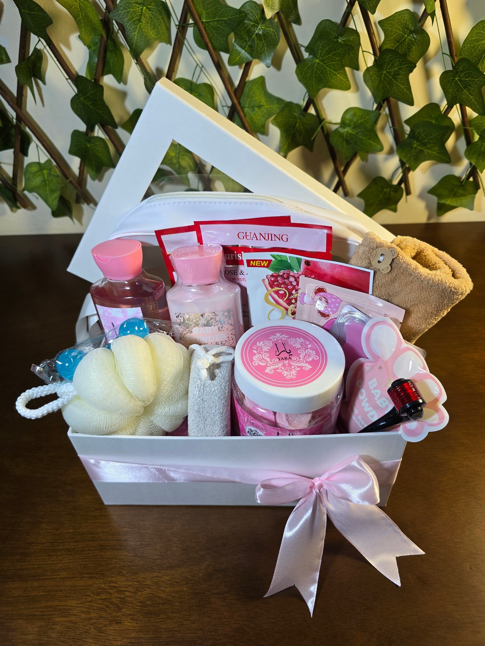 BioCode luxury skincare and bath gift set in a white box with a pink ribbon, featuring lotions, gels, and accessories.