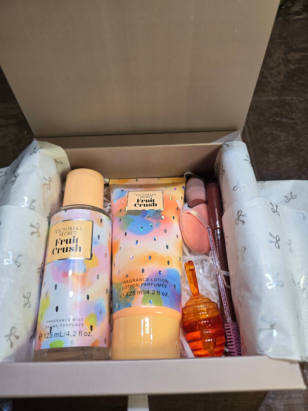 BioCode Victoria's Secret Fruit Crush gift set featuring fragrance mist, lotion, makeup sponges, and lip balm.