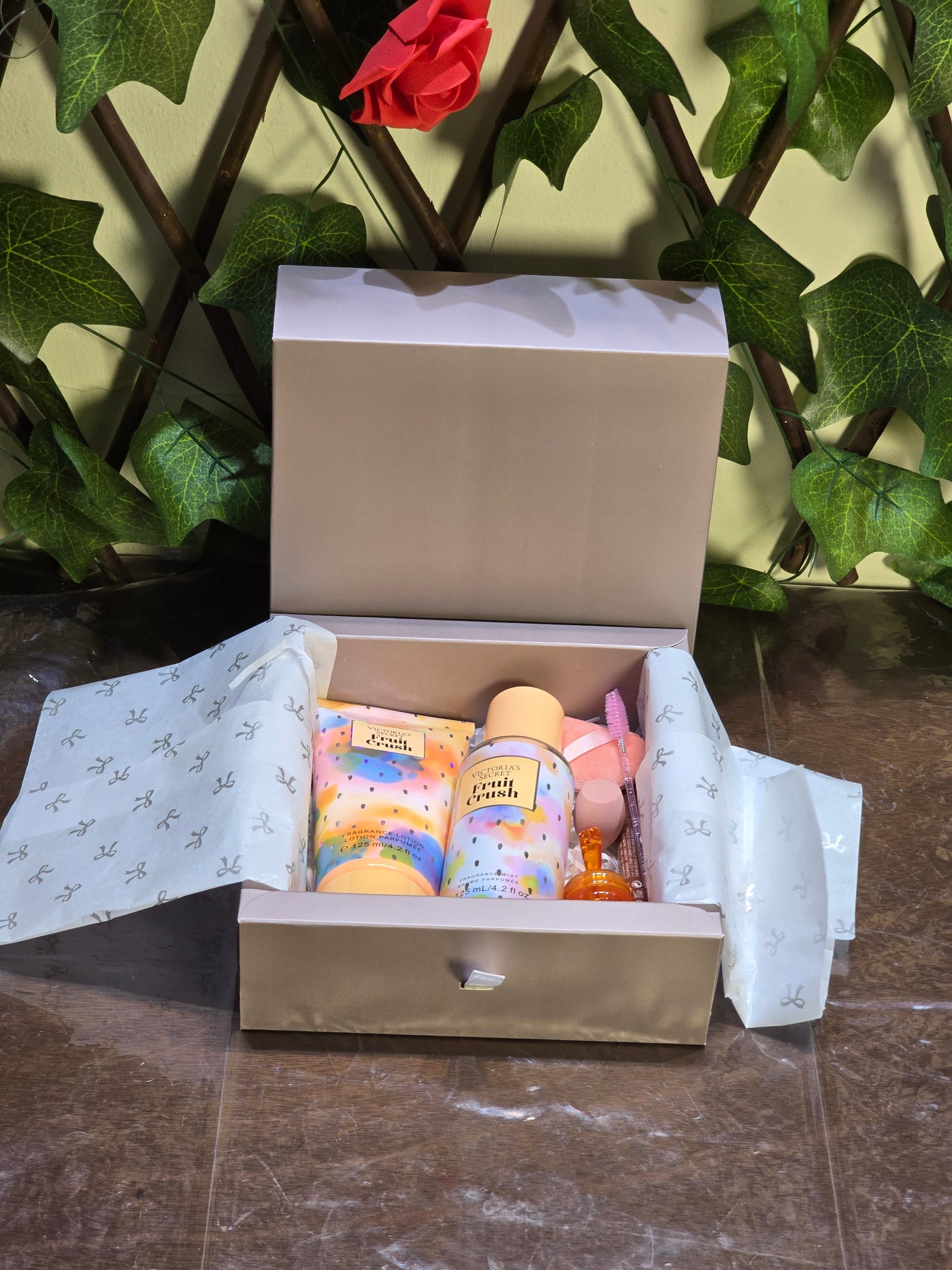 BioCode Victoria's Secret Fruit Crush gift set featuring fragrance mist, lotion, makeup sponges, and lip balm in a box